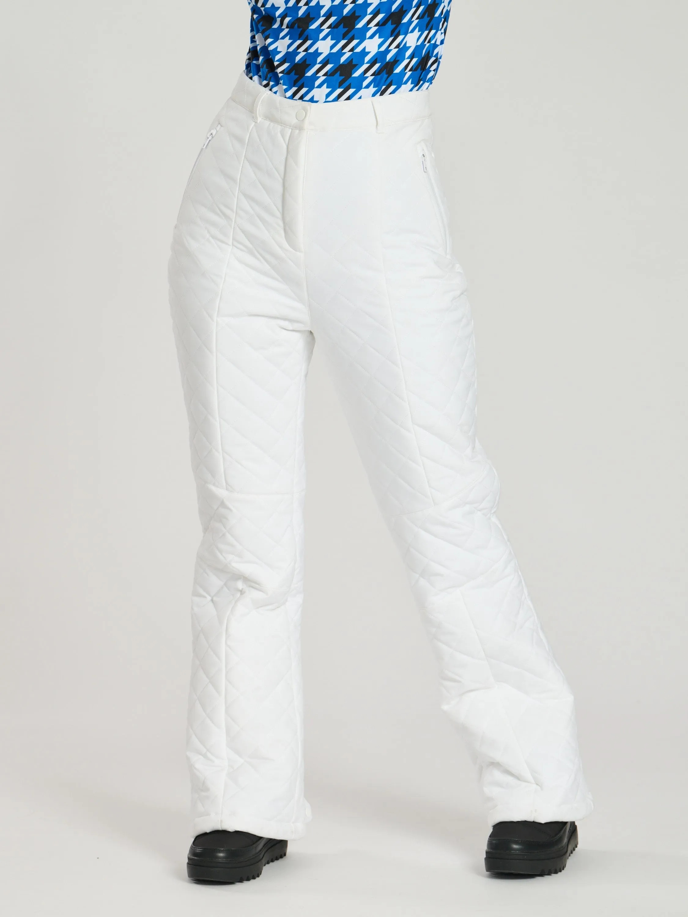 The 'Piste' padded ski trousers in snow white