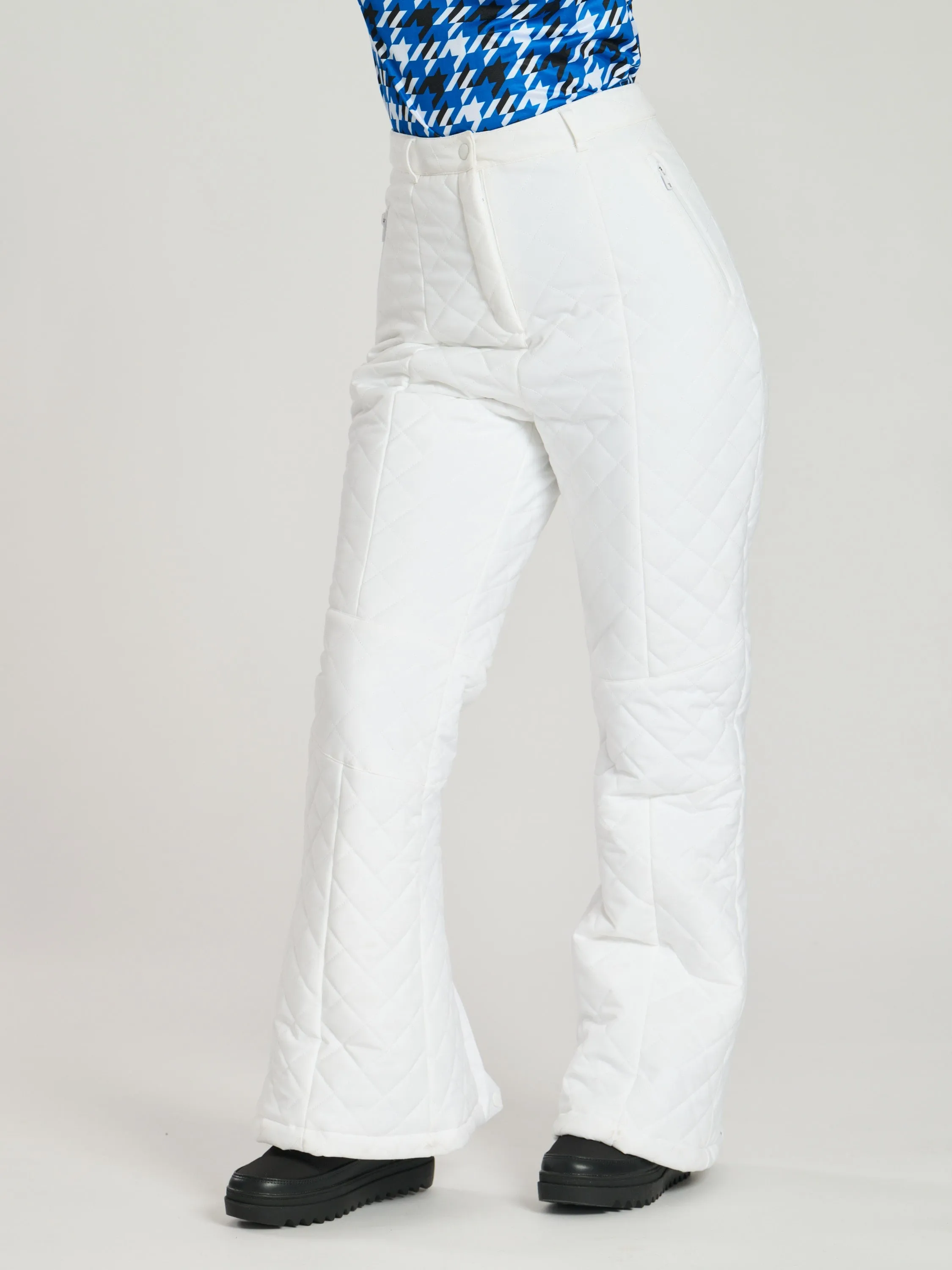 The 'Piste' padded ski trousers in snow white